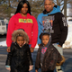 Johnathan King, 31, poses with his girlfriend Brianna Hernandez, their daughter, Zariyah King, 5, and their son Johnathan King, 4, in front of Extended Stay America, an economy apartment hotel chain, where he stayed with his girlfriend and their three children last winter in Schaumburg, IL. The couple was forced out of their subsidized housing apartment at Buena Vista Townhouse Complex in Elgin, IL.